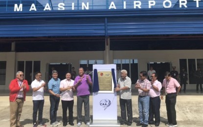 <p>Transportation Secretary Arthur Tugade and Civil Aviation Authority of the Philippines Director General Jim Sydiongco, together with other government officials, lead the unveiling of the Maasin Airport marker. <em>(DOTr photo)</em></p>